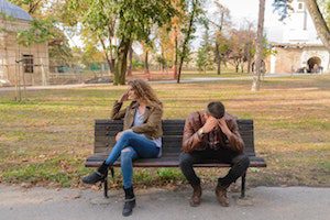 picture of couple on bench not connecting
